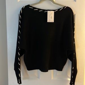 NWT Black Magaschoni Sweater with white stitch accent, size large